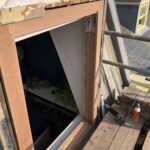 Photo of the dormer opening fully prepped and ready for the new windows to be installed.