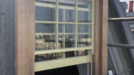 A photograph showcasing the restored dormer window, fully refurbished and installed to professional standards." That should give it a nice, professional touch!